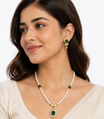Pearl beaded necklace & earrings set with green stone pendant gold-tone setting, oval green stone, cz baguette accents.