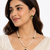 Pearl beaded necklace & earrings set with green stone pendant gold-tone setting, oval green stone, cz baguette accents.