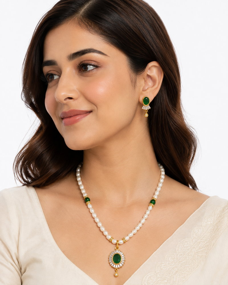 Pearl beaded necklace & earrings set with green stone pendant gold-tone setting, oval green stone, cz baguette accents.
