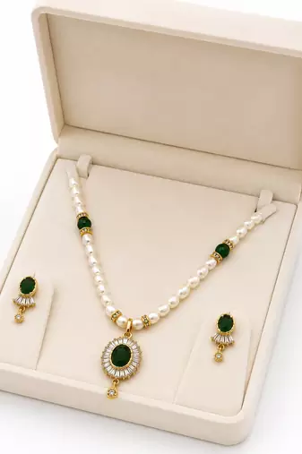Pearl beaded necklace & earrings set with green stone pendant gold-tone setting, oval green stone, cz baguette accents.