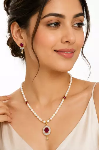 Pearl necklace and earrings set with ruby pendant, gold tone freshwater pearls, cz baguette halo, matching earrings.