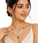 Pearl necklace and earrings set with ruby pendant, gold tone freshwater pearls, cz baguette halo, matching earrings.
