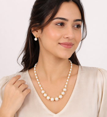 Pearl and gold bead necklace & earrings jewellery set includes earrings, white pearls, gold-tone beads,graduated design. 1