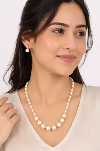 Pearl and gold bead necklace & earrings jewellery set includes earrings, white pearls, gold-tone beads,graduated design.