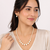 Pearl and gold bead necklace & earrings jewellery set includes earrings, white pearls, gold-tone beads,graduated design.