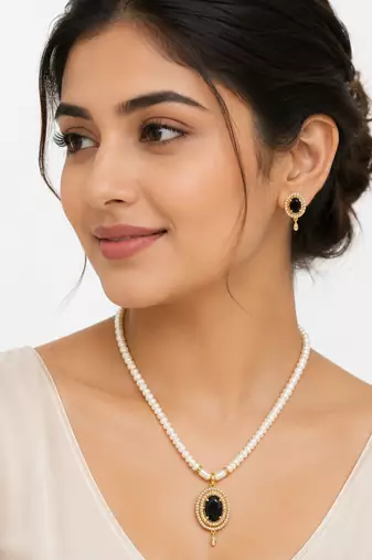 Pearl strand necklace set with black oval pendant and earrings cz stone accents, gold-tone setting, matching earrings.