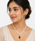 Pearl strand necklace set with black oval pendant and earrings cz stone accents, gold-tone setting, matching earrings.