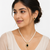 Pearl strand necklace set with black oval pendant and earrings cz stone accents, gold-tone setting, matching earrings.