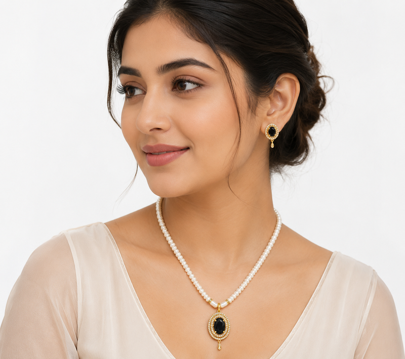 Pearl strand necklace set with black oval pendant and earrings cz stone accents, gold-tone setting, matching earrings.