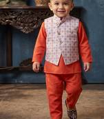 Boy's orange blended cotton ethnic kurta pajama set with printed nehru jacket