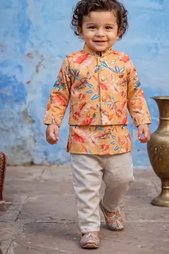 Boy's yellow blended cotton ethnic kurta pajama set with printed nehru jacket