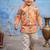 Boy's yellow blended cotton ethnic kurta pajama set with printed nehru jacket