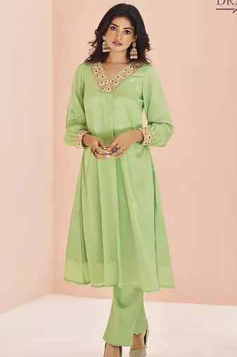 Green hand work embellished kurta set