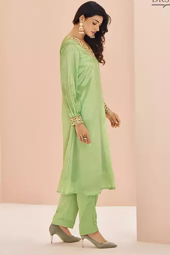 Green hand work embellished kurta set