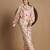 Elegant cream co-ord set with abstract floral and artistic print design