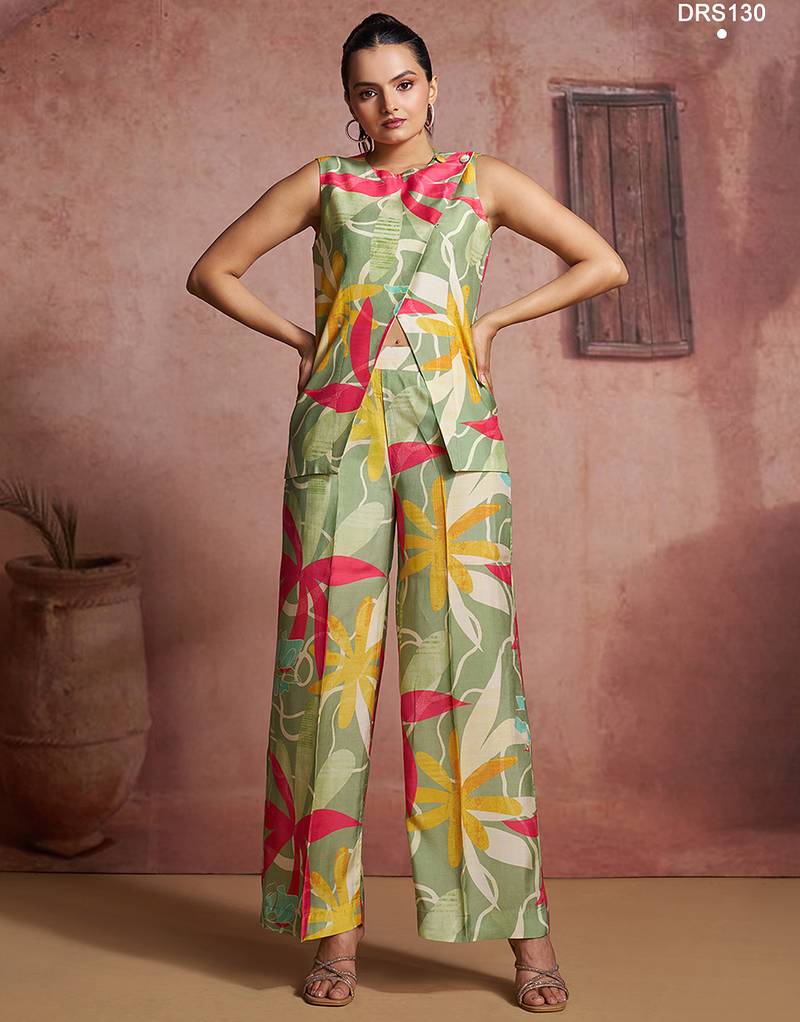 Elegant green muslin cord set with vibrant floral print