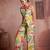 Elegant green muslin cord set with vibrant floral print