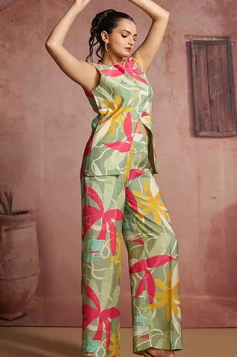Elegant green muslin cord set with vibrant floral print