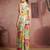 Elegant green muslin cord set with vibrant floral print