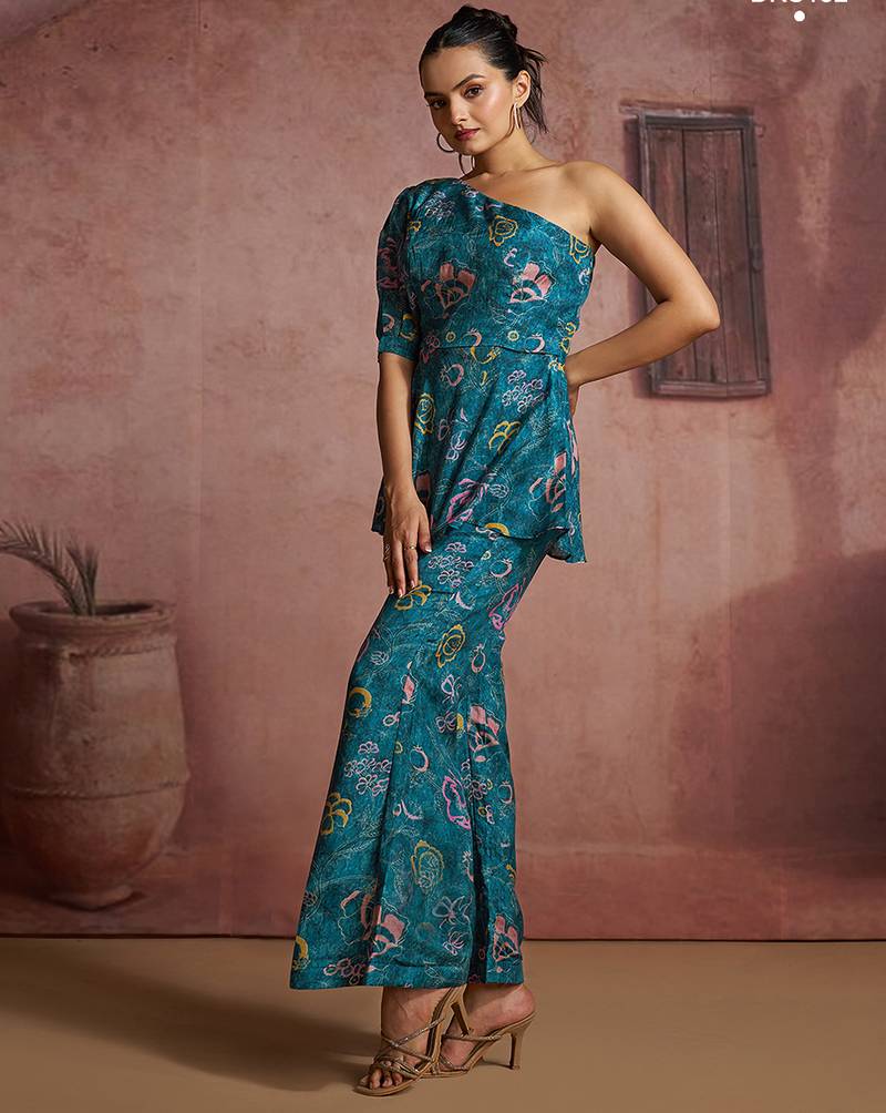 Teal floral one-shoulder peplum top and pants set