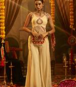 Cream georgette embroidered top with mirror, thread, tassels, shells and palazzo set