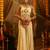 Cream georgette embroidered top with mirror, thread, tassels, shells and palazzo set