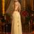 Cream georgette embroidered top with mirror, thread, tassels, shells and palazzo set