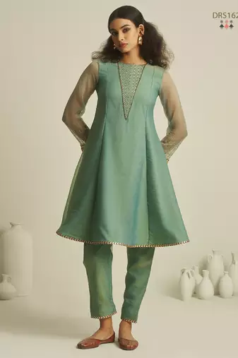 Sea green chiffon kurta set with sheer sleeves and hand embellished detailing