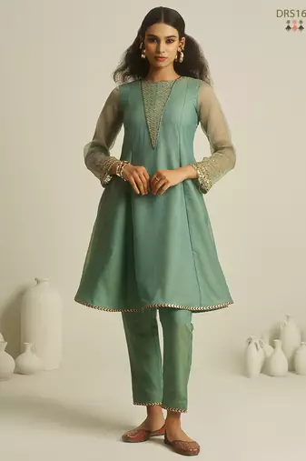 Sea green chiffon kurta set with sheer sleeves and hand embellished detailing