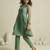 Sea green chiffon kurta set with sheer sleeves and hand embellished detailing