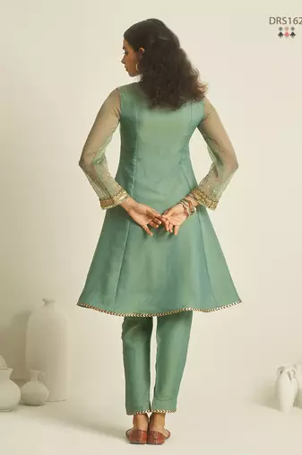 Sea green chiffon kurta set with sheer sleeves and hand embellished detailing