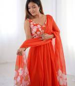 Elegant orange floral organza gown with handwork and matching dupatta