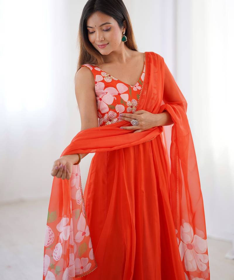 Elegant orange floral organza gown with handwork and matching dupatta