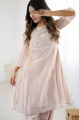 Elegant ivory organza kurta with hand-worked bead embroidery