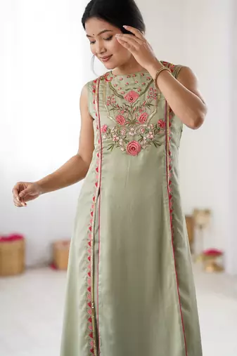 Elegant pista green georgette embroidered straight kurta with coordinated tapered pants set