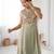 Elegant pista green georgette embroidered straight kurta with coordinated tapered pants set