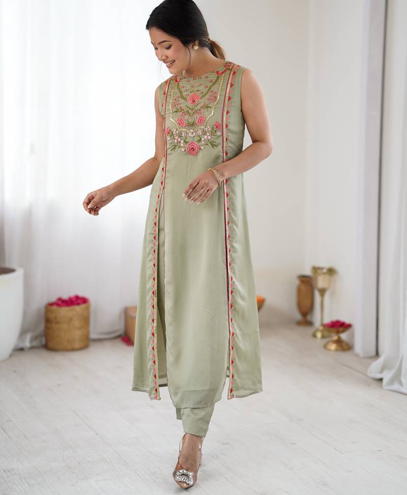 Elegant pista green georgette embroidered straight kurta with coordinated tapered pants set