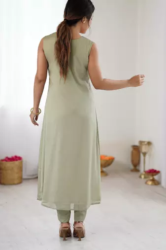 Elegant pista green georgette embroidered straight kurta with coordinated tapered pants set