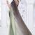 Sequin zarkan embroidered work green and black two tone satin saree