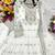 white color embroidery sequins work faux georgette gown set