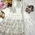 white color embroidery sequins work faux georgette gown set