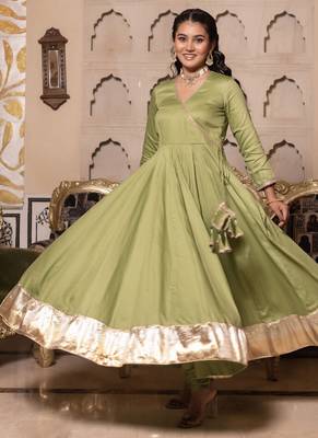 Green silk blend plain anarkali kurta set with dupatta for women 2