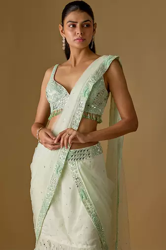 Mint green embroidered satin tulle drape saree set