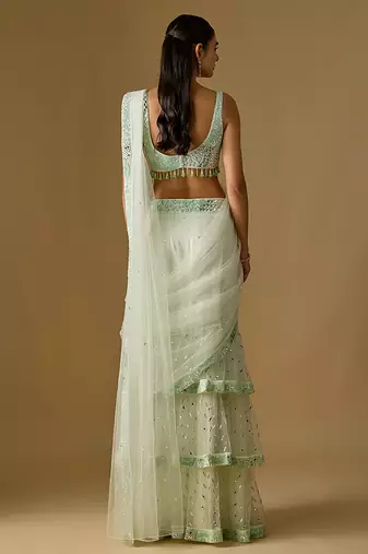 Mint green embroidered satin tulle drape saree set