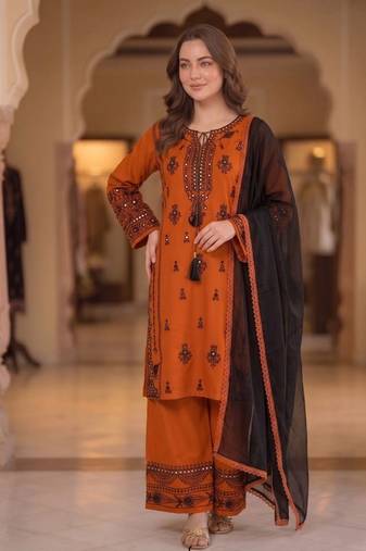 orange color embroidery and mirror work rayon salwar suit