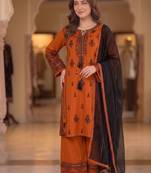 orange color embroidery and mirror work rayon salwar suit