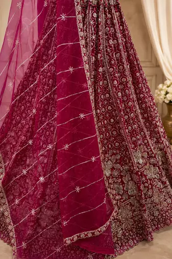rani pink color Crystal and Motif Handwork Sequence work Net Lehenga Choli set