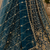 teal color Crystal and Motif Handwork Sequence work Net Lehenga Choli set