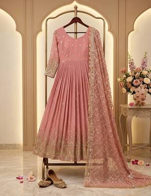 light orange color hevvy sequins emrodery work faux georgette gown set 2