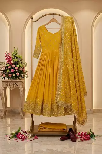 yellow color hevvy sequins emrodery work faux georgette gown set